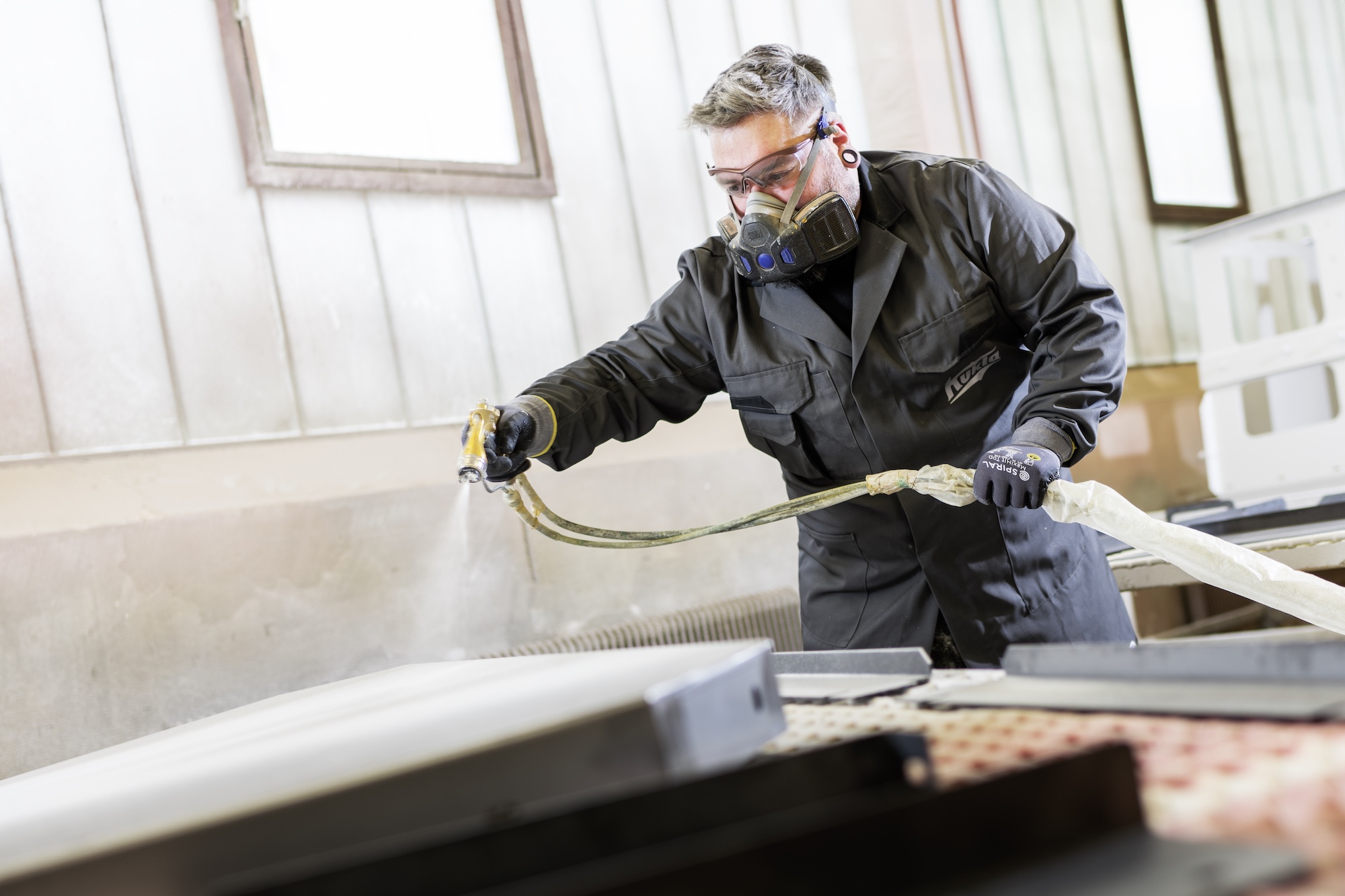 bildstadt – Industriefotografie Imagefotos – Kukla – Arbeiter mit Maske